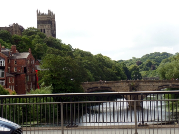 A view of Durham from one of the bridges, with another bridge and castle in the distance