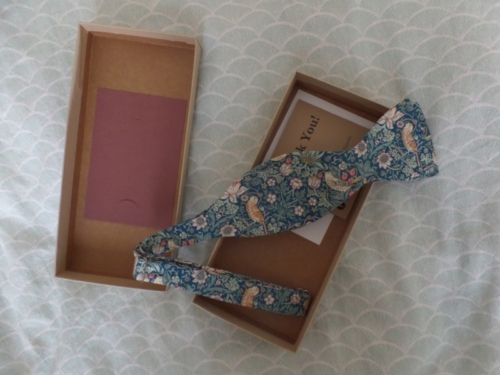 A blue William Morris pattern bow tie