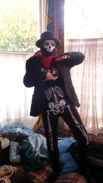 Your humble narrator dressed in a skeleton costume, with a red bandana and a black hat